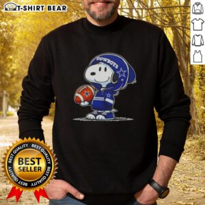 Snoopy in a Dallas Cowboys hoodie smiles at fans, showcasing an Awesome Peanuts sweatshirt design.