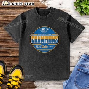 UCLA Big Ten Men's Soccer Tournament Champions 2025 in a happy celebration, wearing a washed t-shirt with the team's logo.