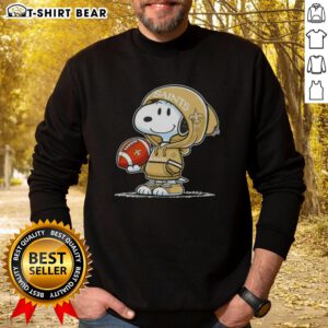 Alt Text: Snoopy in a hoodie supporting the New Orleans Saints, smiling at fans, featured on a stylish sweatshirt.