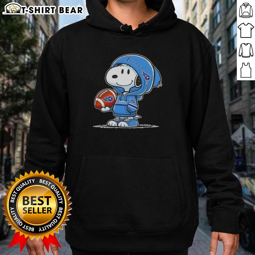Alt Text: Snoopy wearing a Tennessee Titans hoodie, smiling at fans, showcasing official Peanuts merchandise.