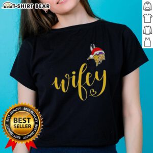 Alt Text: Pretty Wifey Minnesota Vikings Santa hat tee for ladies, perfect for a Merry Christmas celebration.