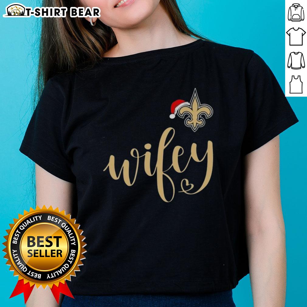 Pretty Wifey New Orleans Saints Santa Hat Merry Christmas Ladies Tee featuring festive design and team spirit.