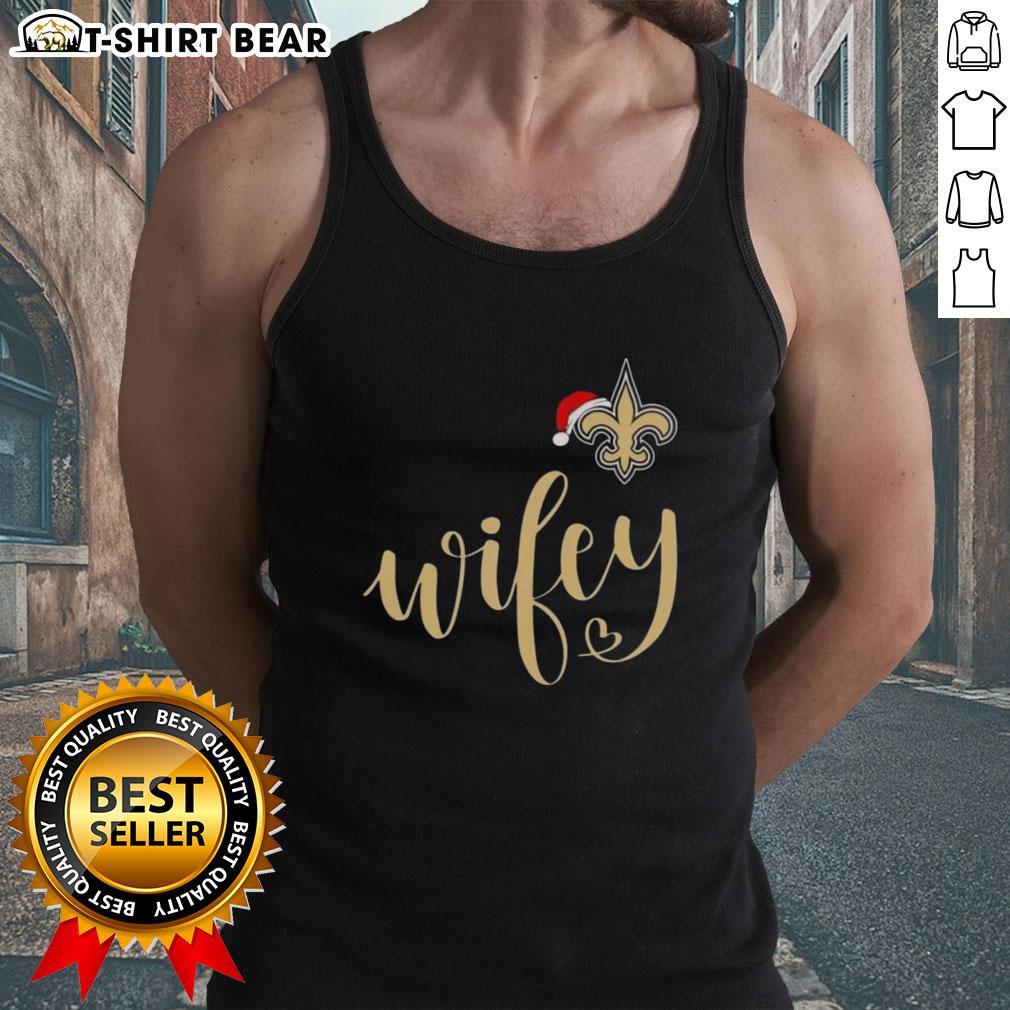 Pretty Wifey New Orleans Saints Santa Hat Merry Christmas Tank Top worn by a woman, showcasing festive holiday spirit.