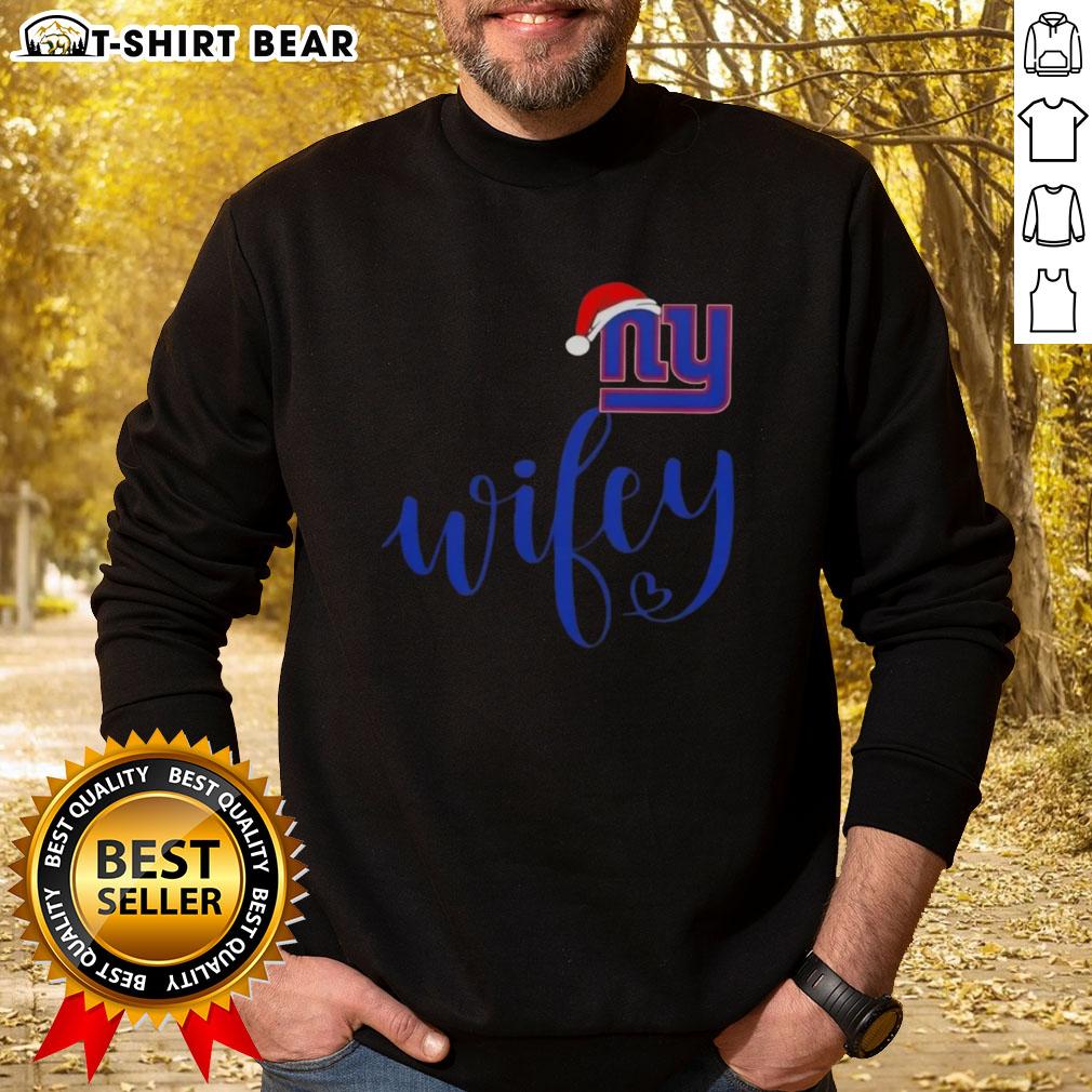 Pretty Wifey New York Giants Santa Hat Merry Christmas Sweatshirt featuring festive design and team spirit for holiday cheer.