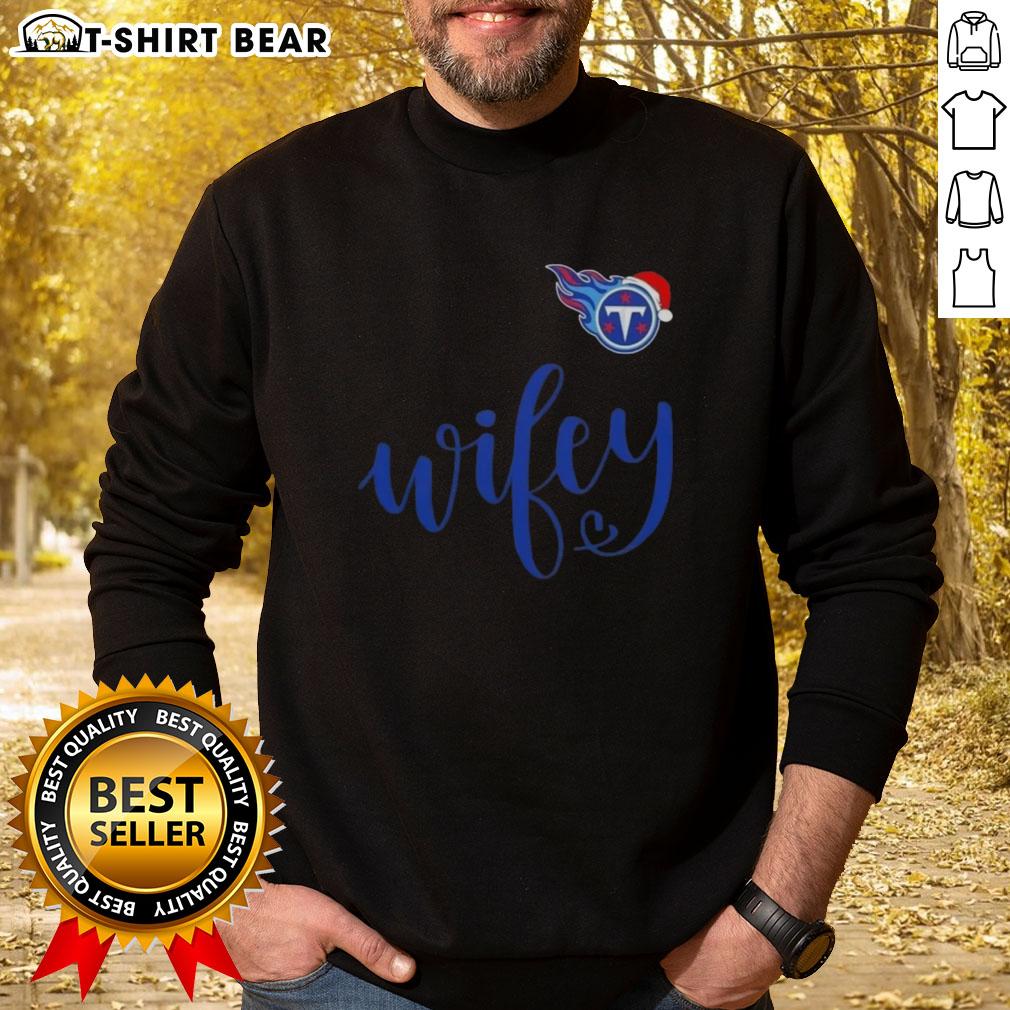 Pretty Wifey Tennessee Titans Santa Hat Merry Christmas Sweatshirt, perfect for festive NFL fans celebrating the holiday season.