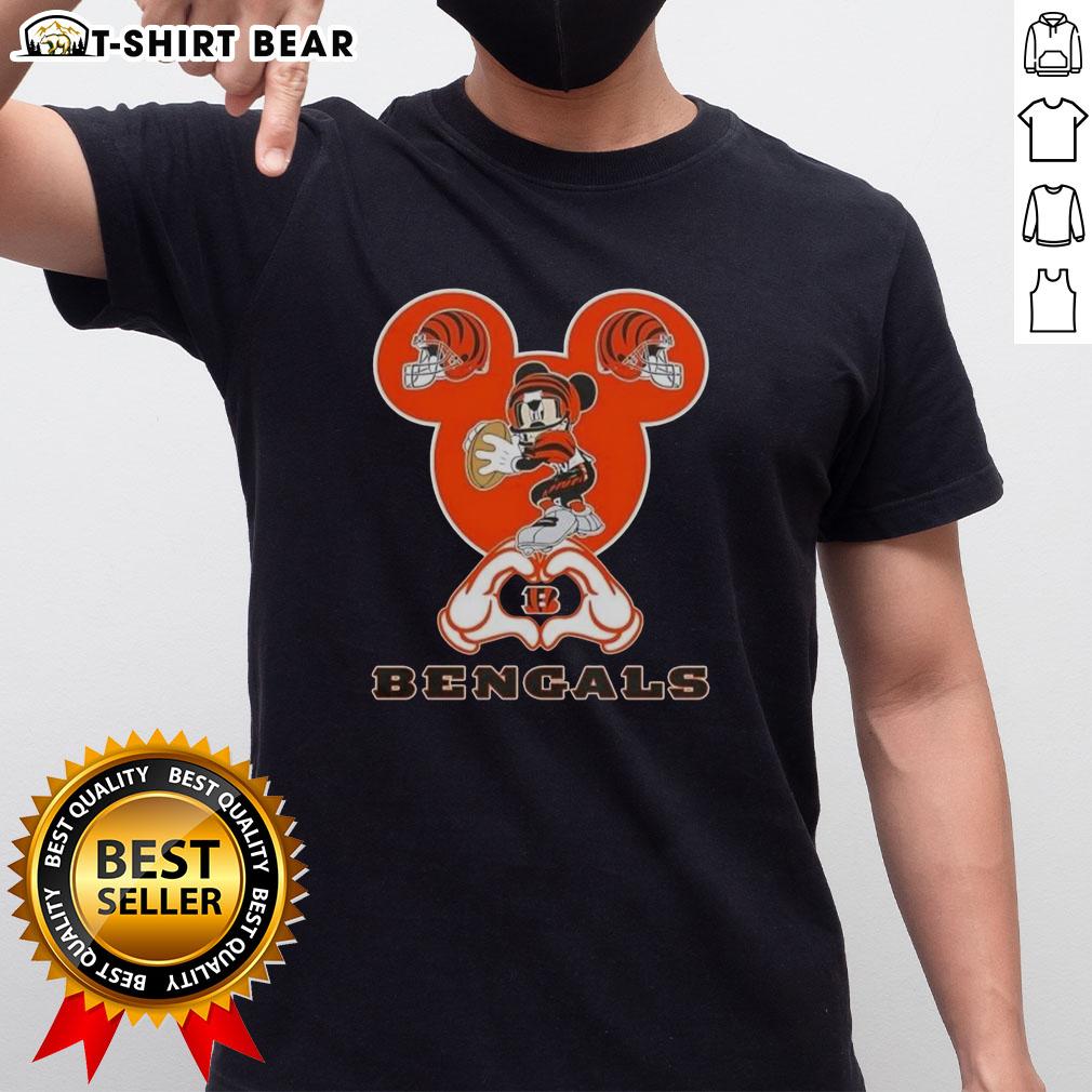 Top Mickey Hands Heart Cincinnati Bengals Football T Shirt Top Mickey Hands Heart Cincinnati Bengals Football T-Shirt featuring a playful Mickey Mouse design for fans.