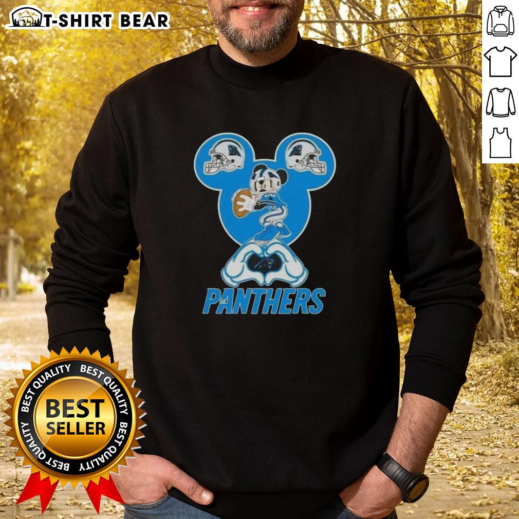 Alt Text: Carolina Panthers football sweatshirt featuring Mickey hands forming a heart, perfect for fans and cozy style.