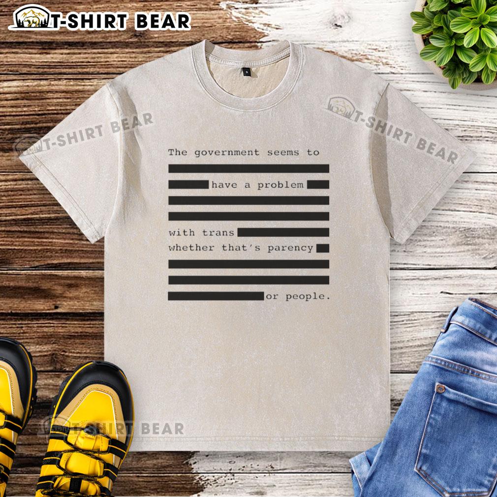 Funny t-shirt depicting government issues with trans rights, showcasing humor in political discourse.