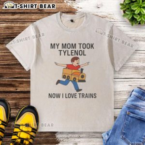 Good My Mom Took Tylenol Now I Love Trains meme on a washed t-shirt, showcasing a humorous, playful design.