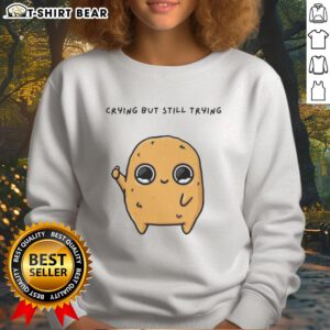Alt Text: Cartoon mascot sweatshirt featuring a good-sad nuggie character crying but trying to smile, perfect for cozy outfits.