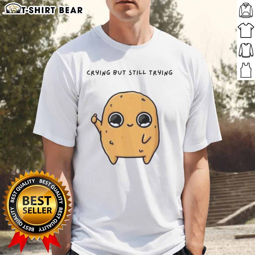 Good Sad Nuggie crying but trying mascot cartoon on a fun t-shirt design, perfect for quirky fashion lovers.