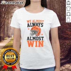 Funny football fan ladies tee reading 'Good We Almost Always Almost Win' for passionate sports enthusiasts.
