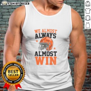 Funny football fan tank top featuring 'Good We Almost Always Almost Win' slogan, perfect for game day attire.