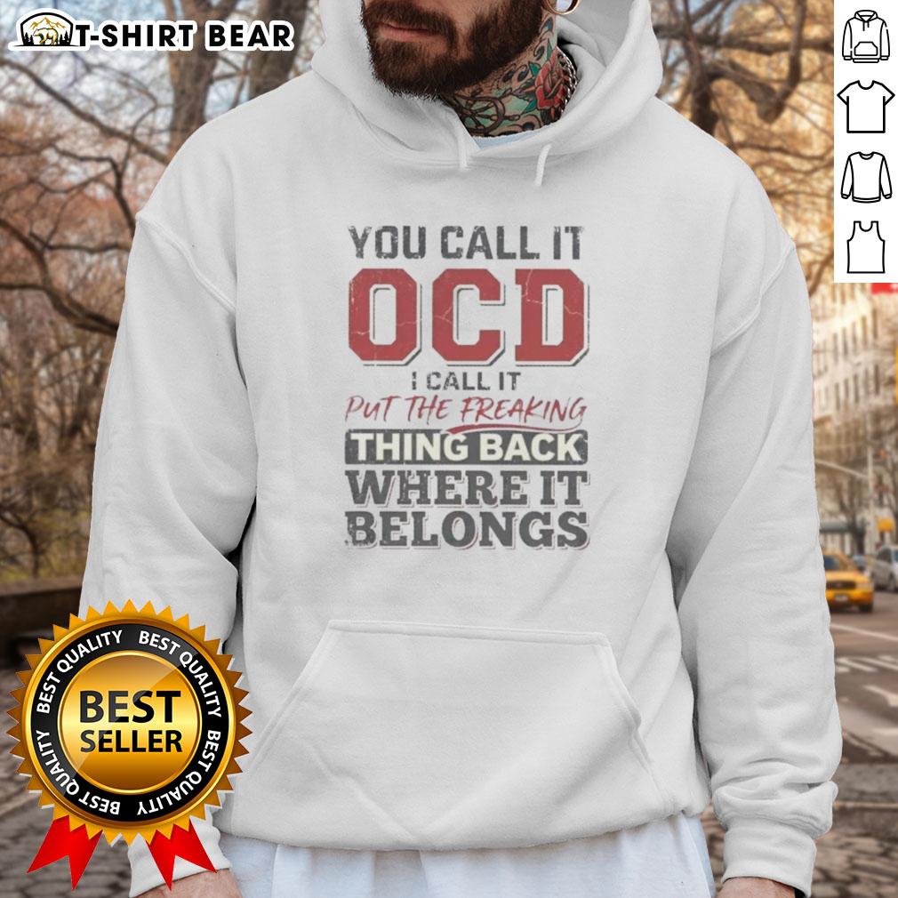 Alt Text: Good You Call It OCD I Call It Put The Freaking Thing Back Where It Belongs Hoodie in black with fun text design.