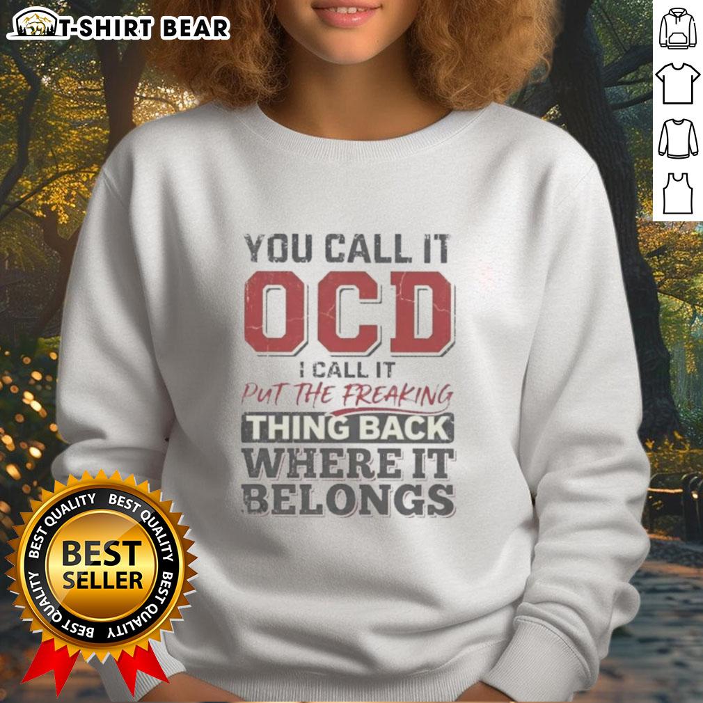 Alt Text: Good You Call It OCD I Call It Put The Freaking Thing Back Where It Belongs Sweatshirt in black with bold lettering.