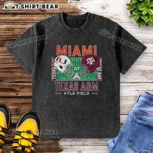 Alt Text: Happy Miami Hurricanes vs Texas A&M Aggies NCAA 2025 helmet washed t-shirt featuring team logos and vibrant colors.