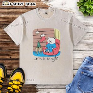 Hot and sleepy polar bear relaxing on a washed t-shirt, showcasing a playful design perfect for casual wear.