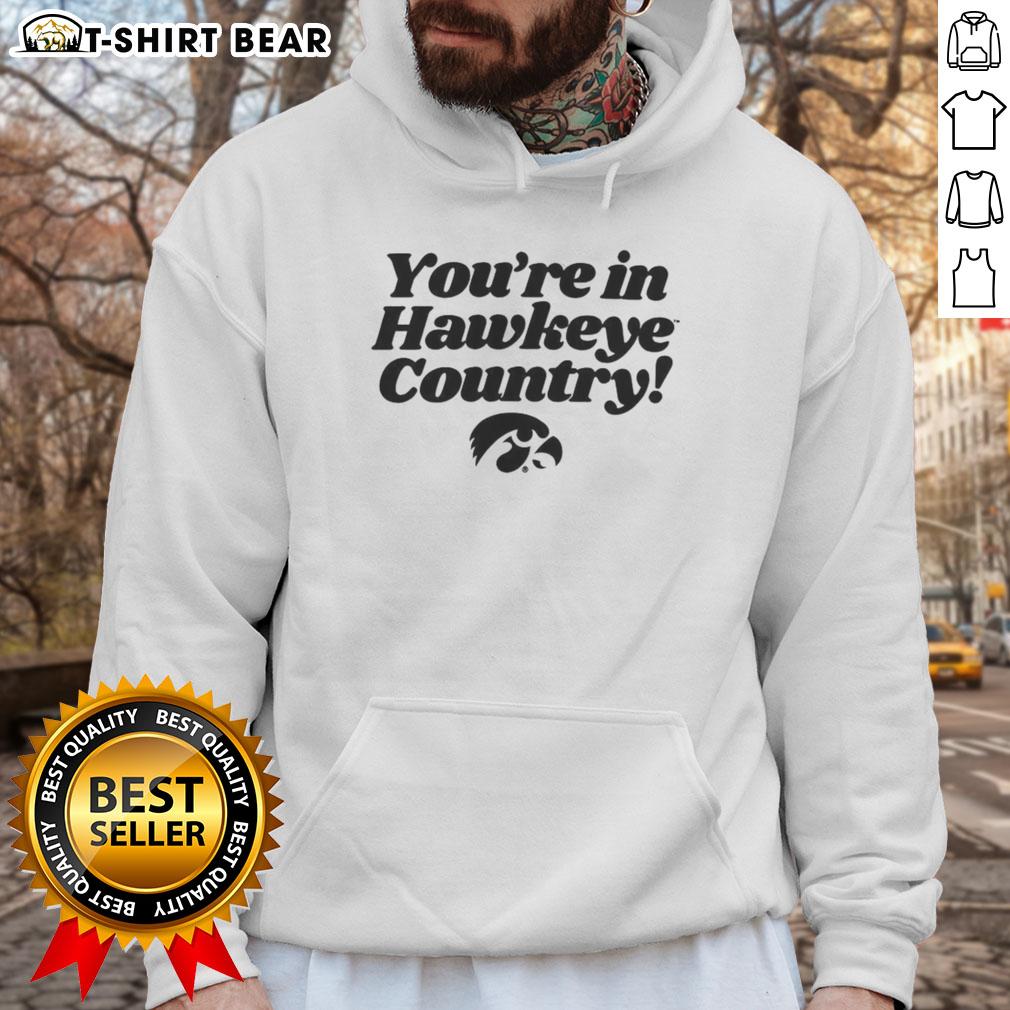 Cozy 'Hot You're in Hawkeye Country' hoodie displayed on a mannequin against a rustic backdrop, perfect for fans.