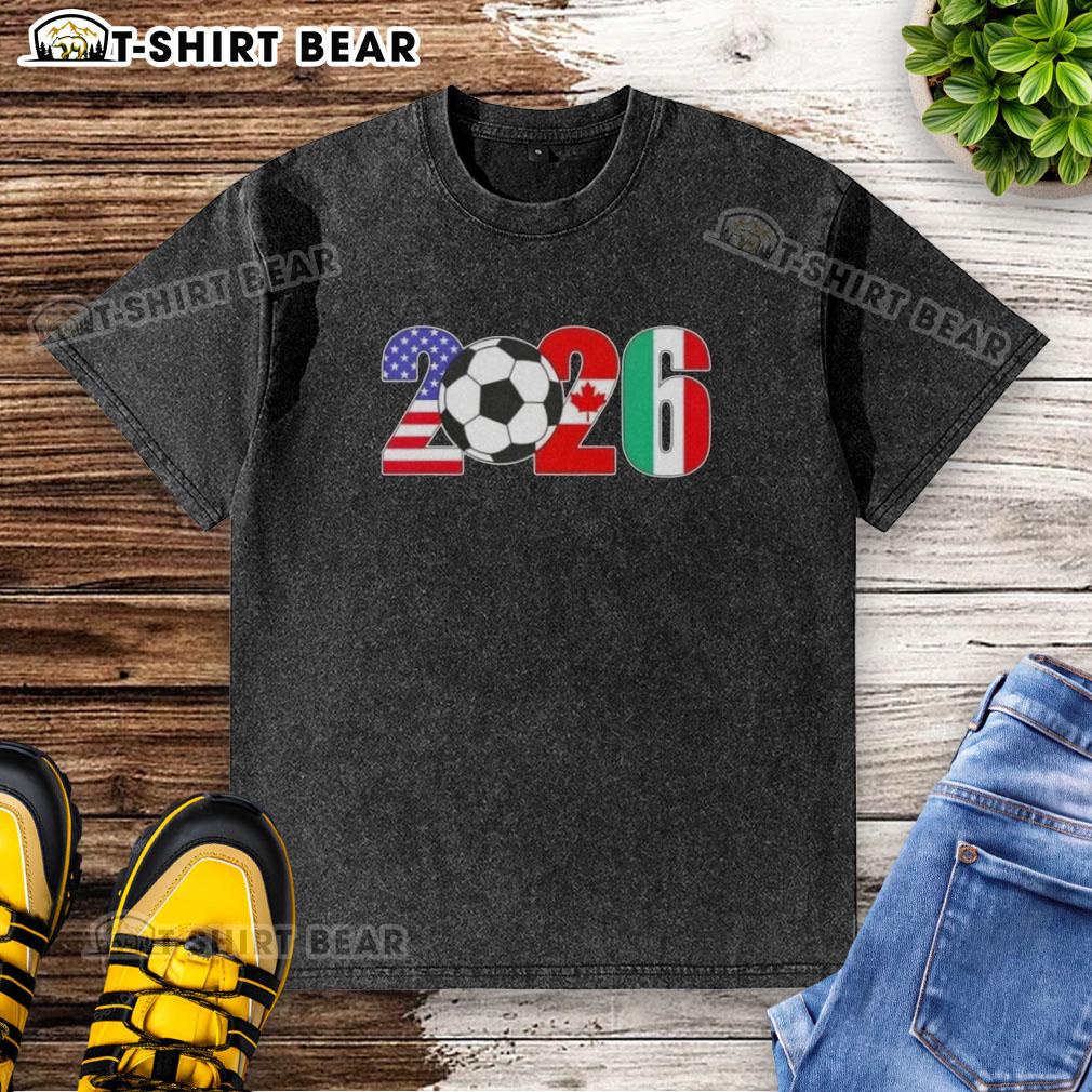 Alt Text: Nice 2026 International Soccer Tournament flags on a washed t-shirt, showcasing vibrant colors and sporty design.