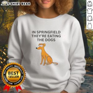 Nice in Springfield sweatshirt featuring playful dog graphics, perfect for pet lovers and casual wear enthusiasts.