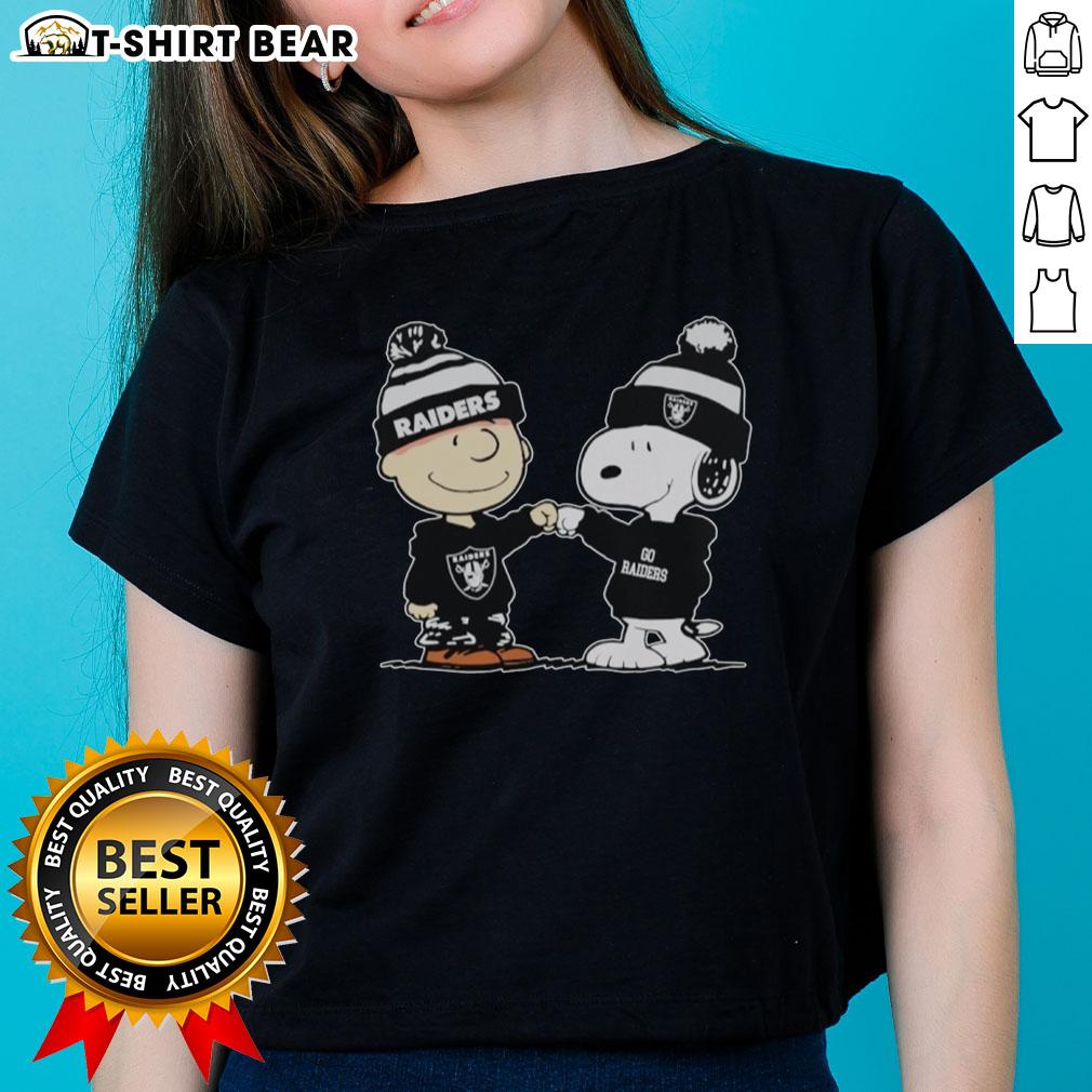 Alt Text: Official Los Angeles Raiders Snoopy and Charlie Brown Best Friends Ladies Tee featuring playful cartoon design.