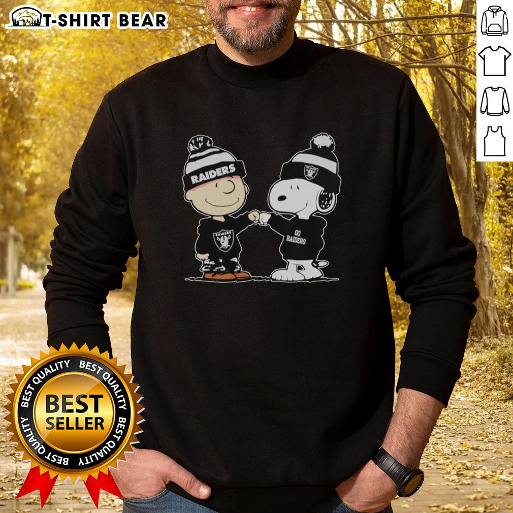 Alt Text: Official Los Angeles Raiders Snoopy and Charlie Brown Best Friends Sweatshirt featuring iconic characters in team colors.