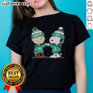 Official New York Jets Snoopy and Charlie Brown Best Friends Ladies Tee featuring vibrant graphics and team colors.
