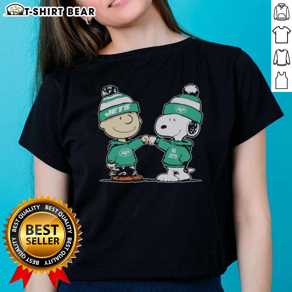 Official New York Jets Snoopy and Charlie Brown Best Friends Ladies Tee featuring vibrant graphics and team colors.