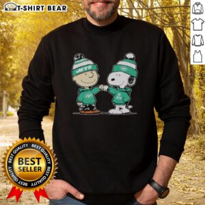 Alt Text: Official New York Jets Snoopy and Charlie Brown Best Friends Sweatshirt featuring vibrant graphics and cozy design.