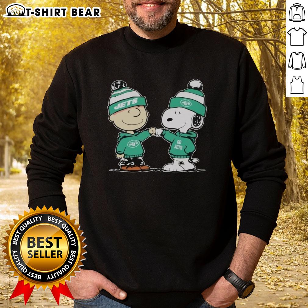 Alt Text: Official New York Jets Snoopy and Charlie Brown Best Friends Sweatshirt featuring vibrant graphics and cozy design.