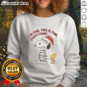 Alt Text: Official Peanuts Snoopy and Woodstock 'I'm Fine, This Is Fine' Christmas Lights Sweatshirt design featuring festive characters.