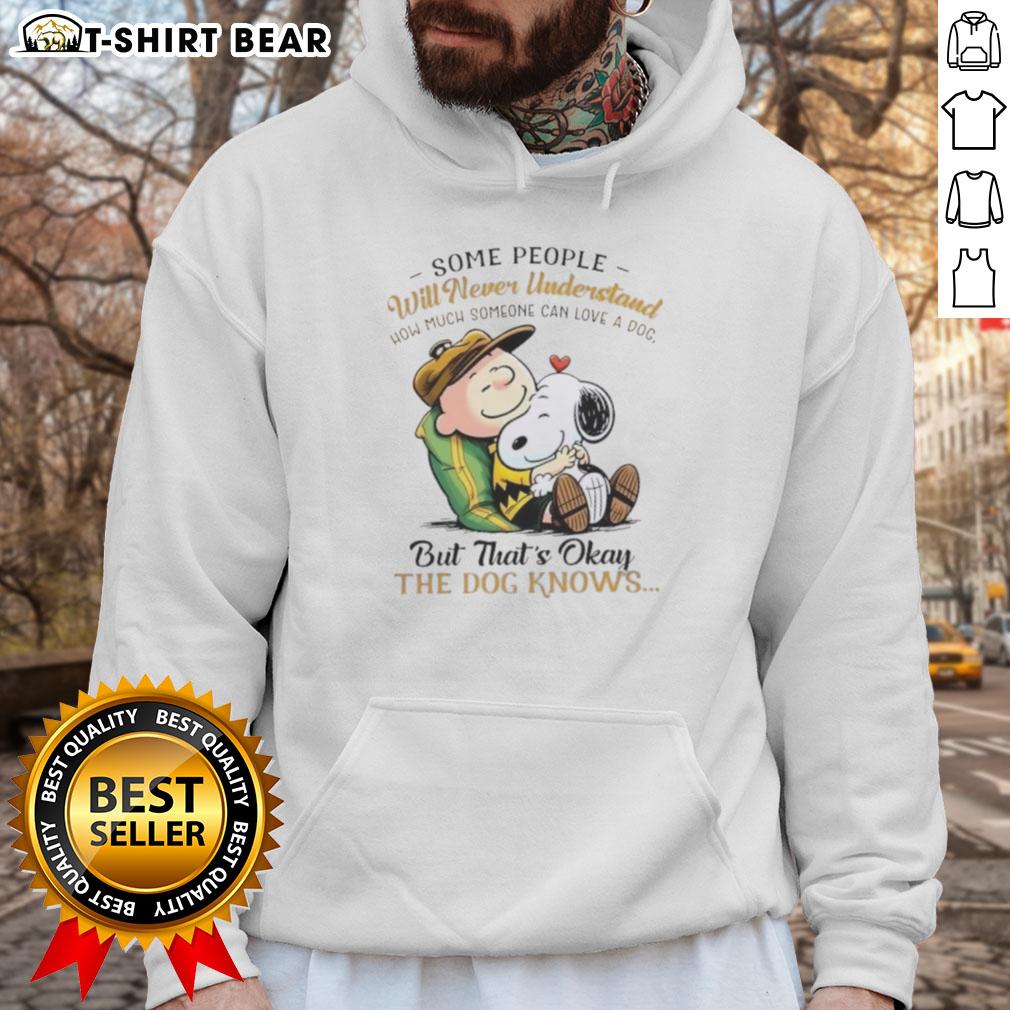Official Snoopy and Charlie Brown hoodie featuring the quote about love for dogs, perfect for dog lovers and fans.