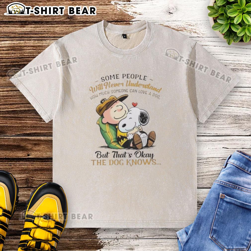 Official Snoopy and Charlie Brown washed t-shirt featuring the quote about loving a dog. Perfect for Peanuts fans!