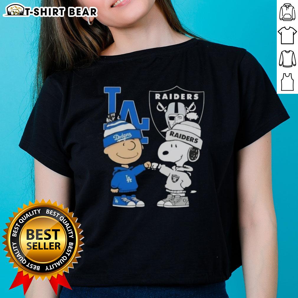 Alt Text: Original Charlie Brown fist bump with Snoopy, celebrating Los Angeles City sports, Dodgers, and Raiders on a ladies' tee.