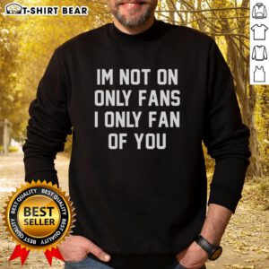 Original 'I'm Not On OnlyFans, I'm Only a Fan of You' sweatshirt design, perfect for cozy, witty fashion lovers.