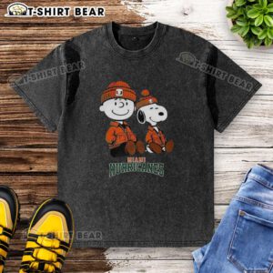 Premium Charlie Brown and Snoopy Miami Hurricanes washed t-shirt featuring vibrant graphics and a comfortable fit.
