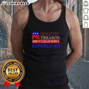 Premium tank top featuring the slogan 'Helping The Enemy Used To Be Called Treason, Now It's Called Being A Republican.'