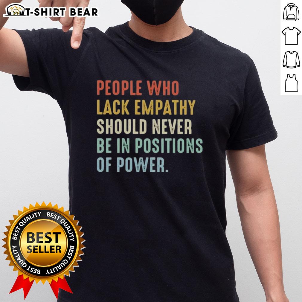 Stylish t-shirt featuring the phrase 'Pretty People Who Lack Empathy Should Never Be In Positions Of Power' in bold print.