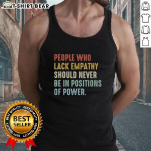Empathetic individuals stand united in tank tops, highlighting the message: Pretty people who lack empathy shouldn't hold power.