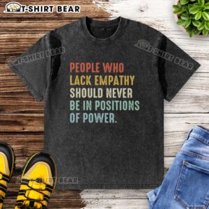 Pretty people wearing 'Empathy-less Power' t-shirt, highlighting the importance of empathy in leadership roles.