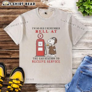 Alt Text: Vintage Snoopy t-shirt featuring the phrase about remembering gas station service bells, perfect for nostalgic fans.