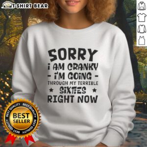 Cozy sweatshirt reading 'Pretty Sorry I Am Cranky, I'm Going Through My Terrible Sixties' - perfect for casual wear.