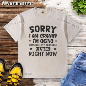 Washed t-shirt with the phrase 'Pretty Sorry I Am Cranky, I'm Going Through My Terrible Sixties' for a humorous touch.