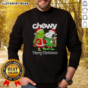 Alt Text: Cozy Top Chewy X Grinch and Snoopy Merry Christmas sweatshirt featuring festive graphics for holiday cheer.