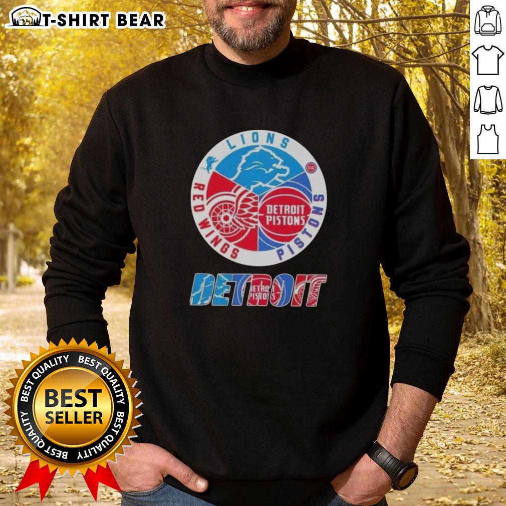 Top Detroit City Sports sweatshirt featuring logos of Lions, Pistons, and Red Wings, perfect for sports fans.