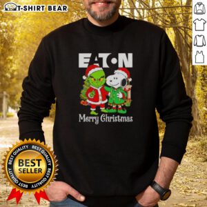 Top Eaton Corporation X Grinch and Snoopy Merry Christmas sweatshirt featuring colorful holiday designs and festive graphics.