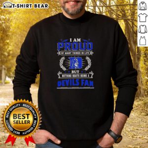 Alt Text: Duke Blue Devils fan sweatshirt with 'I Am Proud Of Many Things But Nothing Beats Being A Duke Fan' design.