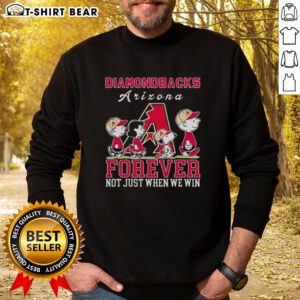 Cute Snoopy and Charlie Brown Arizona Diamondbacks baseball sweatshirt, celebrating fandom with 'Forever, Not Just When We Win' slogan.