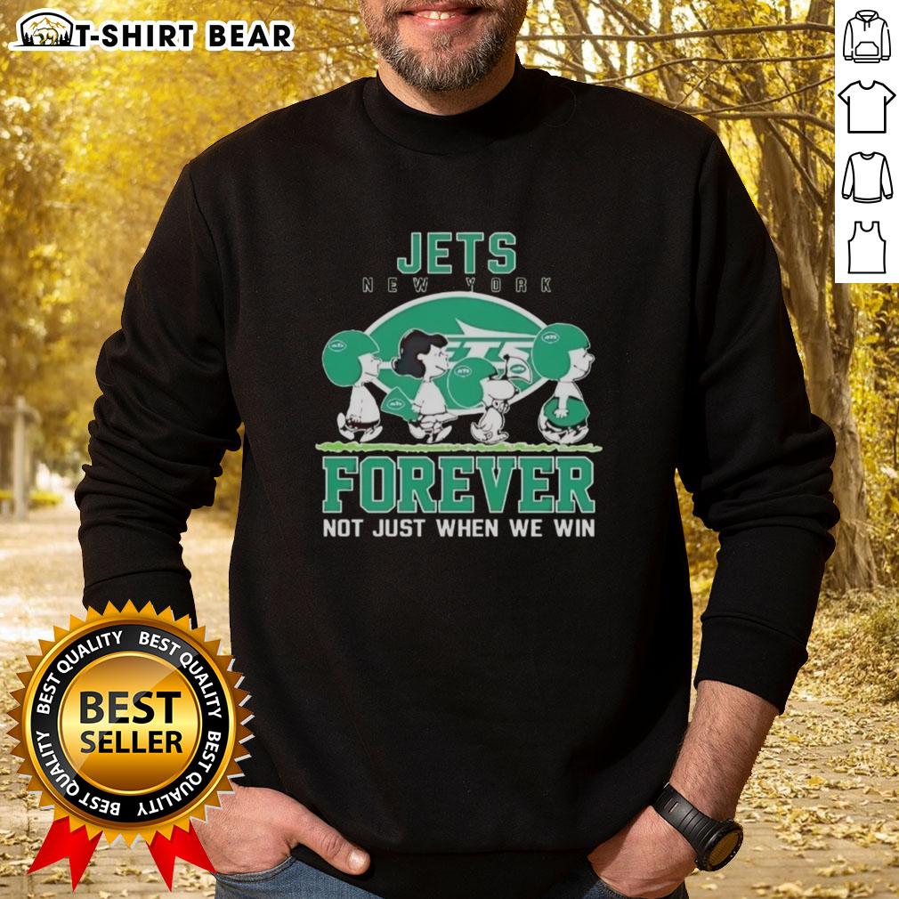 Alt Text: Cute Snoopy and Charlie Brown in New York Jets sweatshirt, showcasing Forever Not Just When We Win slogan.