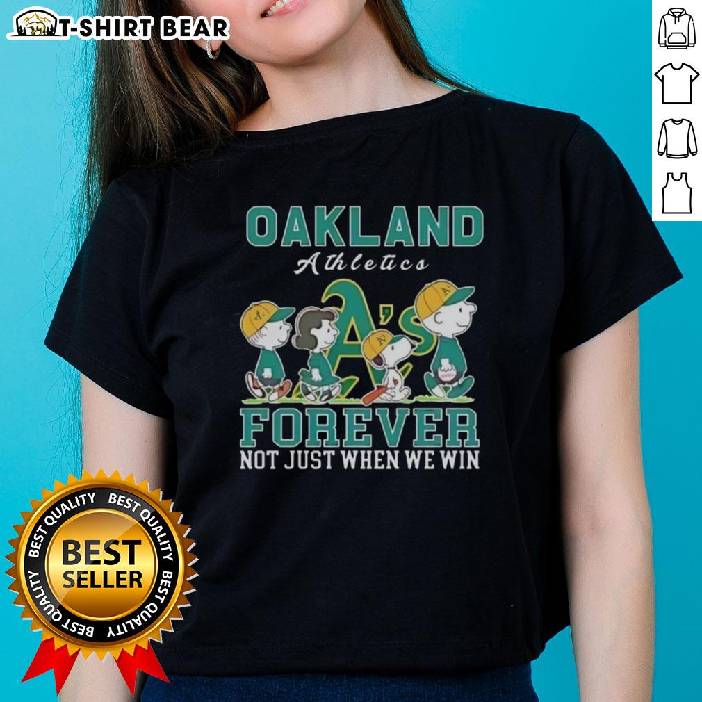 Alt Text: Cute Snoopy and Charlie Brown graphic on Oakland Athletics baseball tee, celebrating fandom beyond winning.